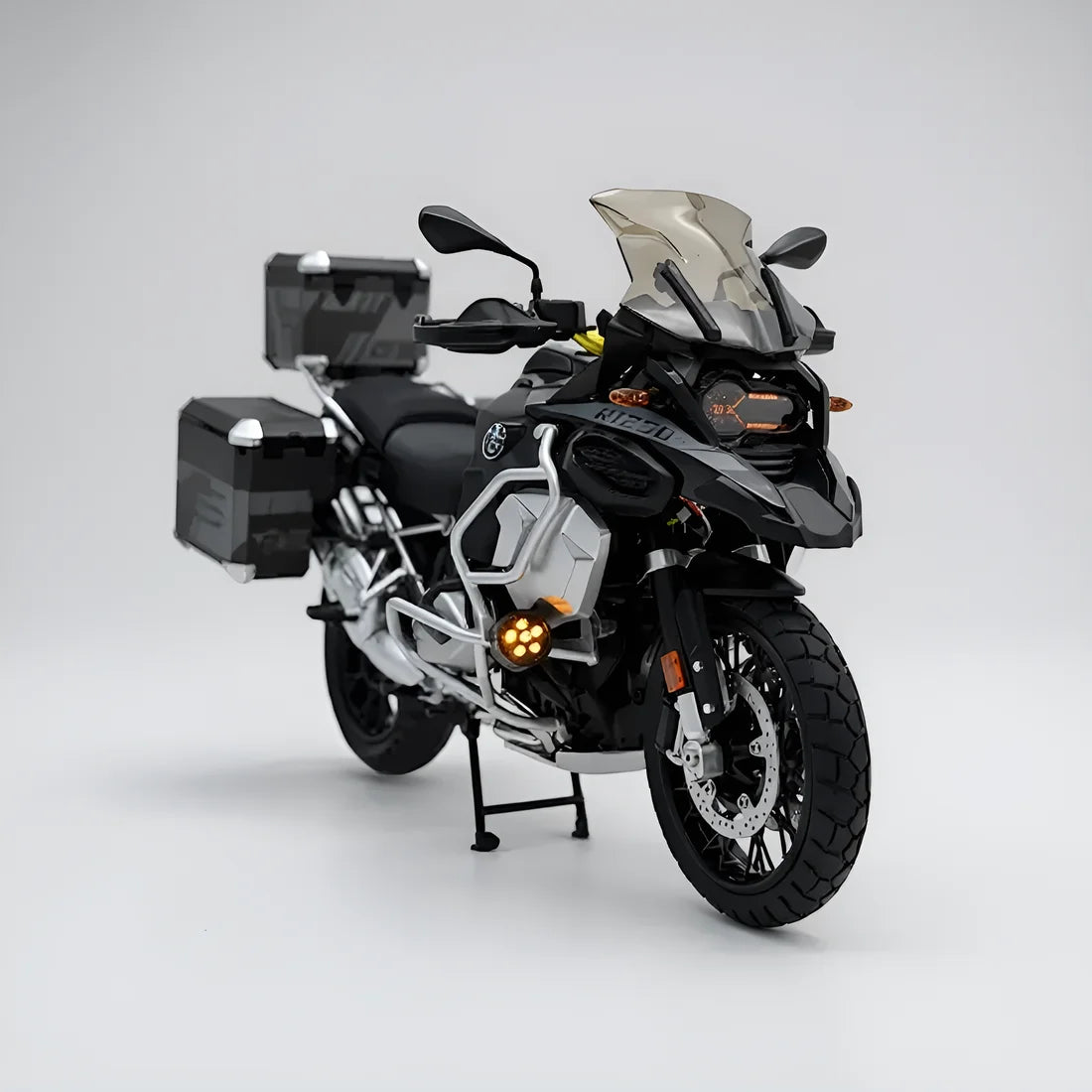Miniature moto R1250GS noire avec effets lumineux LED jaunes et top cases Adventure échelle 1:7