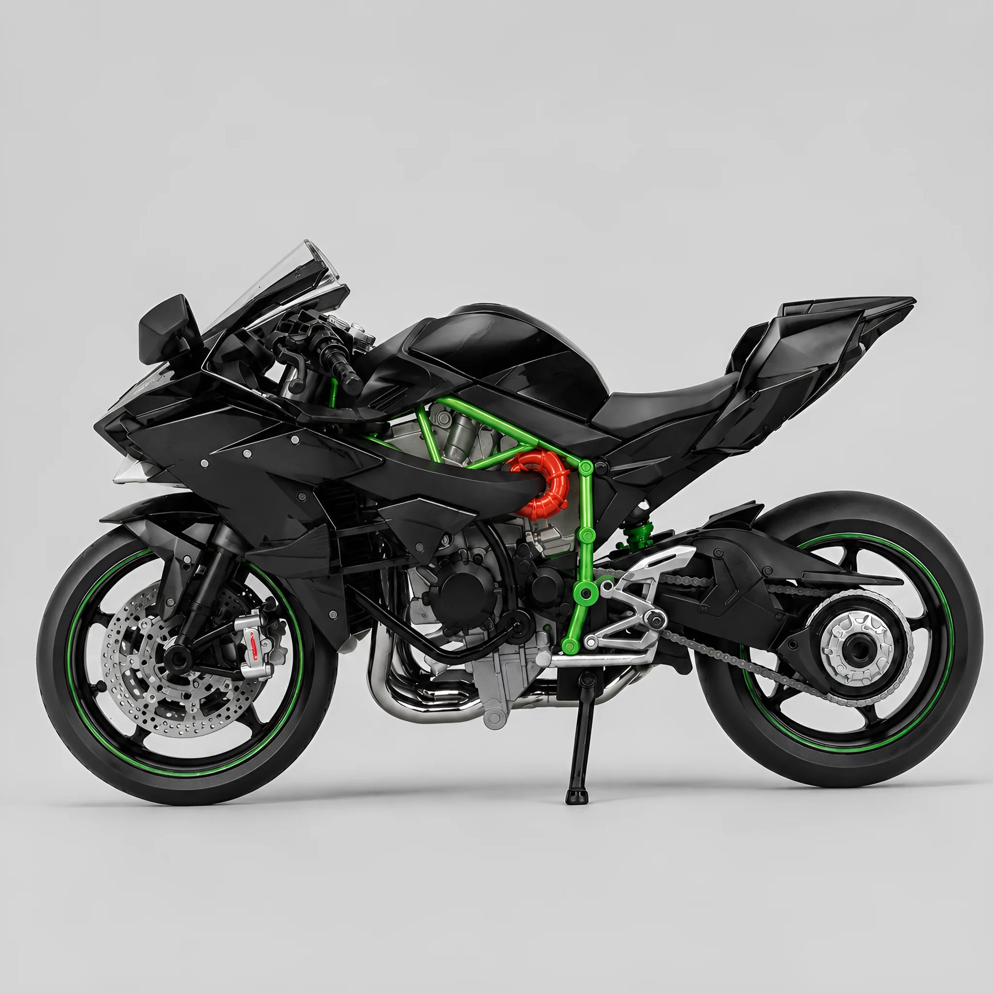 Miniature moto style Ninja H2R échelle 1:9 — vue profil gauche, carénage noir brillant, cadre vert